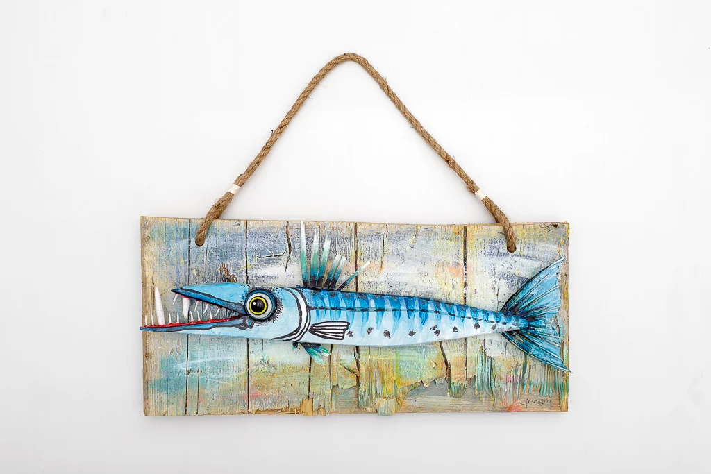 Hand-carved 50cm solid reclaimed wood barracuda sculpture with vibrant blue Caribbean markings and natural jute rope hanger by Mario Diaz Art.